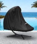 Heavy Duty 73 Inch Waterproof Patio Hanging Chaise Lounge Cover With Handle Bombproof Durable 600D UV Protected All Weather Outdoor Hammock Chair Swing Protector Black covering chair by pool.
