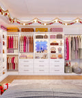 Sleek White Corner Closet System With Nine Wooden Drawers And Adjustable Shelves For Spacious Walk In Storage Organizer featuring colorful clothing and organized drawers.