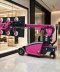 Heavy Duty Glass Panel Lifter With Rock Solid Vacuum Suction For Architectural Install And Window Mounting Work That Demands No Sweat Pro Grade Gear in pink color, lifting large glass panel inside a modern retail space.