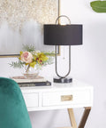 Oval Shaped Metal Table Lamp For Living Room, Black Iron Base With Marble Accents And Linen Fabric Shade on desk