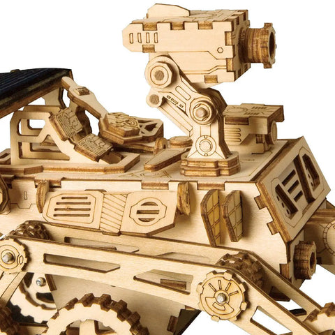 Close-up of Solar Powered Cars Kit With Movable 3D Wooden Puzzle Toys showing upper deck details of Curiosity Rover theme.
