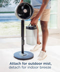 Person using FlexBreeze Pro Mist Fan Indoor Outdoor Chill Machine With Built-In Misting Converts From Pedestal To Tabletop Corded Or Cordless