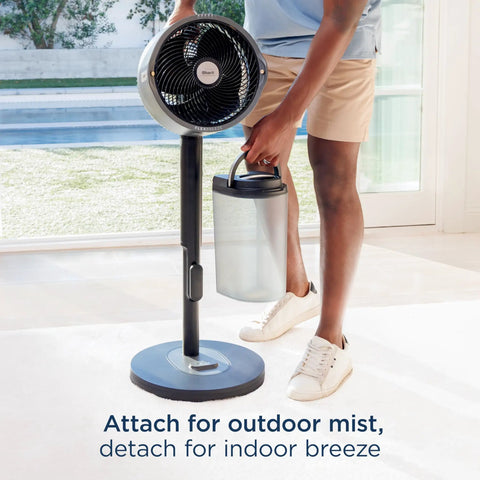 Person using FlexBreeze Pro Mist Fan Indoor Outdoor Chill Machine With Built-In Misting Converts From Pedestal To Tabletop Corded Or Cordless
