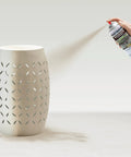 Prime Hella Durable Textured Spray Paint Quick Dry Oil Based Rust Preventer Coating For Wood Metal Concrete And Masonry Weather Resistant Exterior Interior Finish Desert Bisque applied on decorative pot.