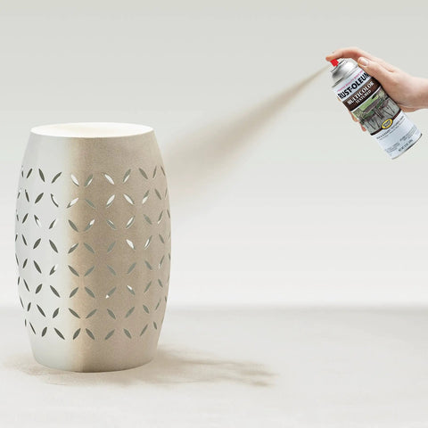 Prime Hella Durable Textured Spray Paint Quick Dry Oil Based Rust Preventer Coating For Wood Metal Concrete And Masonry Weather Resistant Exterior Interior Finish Desert Bisque applied on decorative pot.