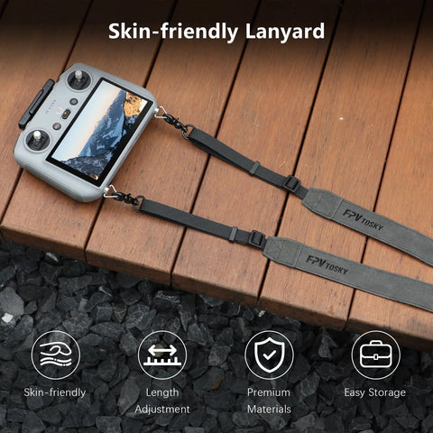 Soft Leather Neck Strap Lanyard For Dji Rc 2 And Rc Pro 2 Remotes Built Legit To Catch Heavy Drops And Provide Killer Shock Absorption For Drone Pilots Protecting Their Controllers During Epic Runs, showing grey padded strap attached to DJI remote.