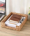 Water Hyacinth Letter Tray Desk Organizer with rustic wicker mail sorter, sturdy metal frame, on desk with glasses and notebook.