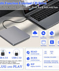 USB C External SuperDrive For Mac Slot In DVD RW Drive Aluminum Space Grey Compatible With Apple MacBooks Desktops Ultra Slim Aluminum Casing With Fingerprint Resistant Finish And Easy Plug And Play USB C Connection. USB-C drive on MacBook with cable