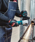 Heavy Duty 6 Inch Cut Off And Angle Grinder With 13 Amp Motor Variable Speed 4000 To 10000 RPM SJS System in use cutting metal pipe