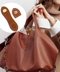 Eight Sets Leather Snap Buckles With Snap Button Closure Sew On For Wallets Bags And Notebooks Black And Light Brown Durable Leather Purse Fasteners For DIY Craft Projects shown on a bag.