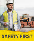 Construction worker wearing High Visibility Safety Vest 10 Pack Neon Yellow Mesh With Reflective Silver Strips at site.