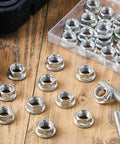 32 Piece Rock Solid Heavy Duty Stainless Steel Hex Flange Locking Nuts M10 X 1.25 Metric Fine Thread Rust Resistant on wooden surface.