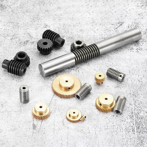 uxcell worm gear set parts laid out: brass gears, steel shaft with threaded section, black gears and spacers