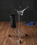 Road Ready Adjustable Snare Drum Stand With Heavy Duty Rubber Feet And Legit Double Braced Tripod featuring quick pull drumstick holder.