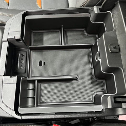 Center Console Organizer Tray For Full Size Trucks Fits Silverado 1500 Sierra 2500HD 3500HD With Bucket Seats Black Durable ABS Plastic Easy Install In Cabin Storage Boost For Your Ride, visible inside truck console.