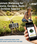 Person using app to control Must-Have 4 Port Smart Hose Watering Timer With Wi-Fi Hub And WeatherSense for garden irrigation