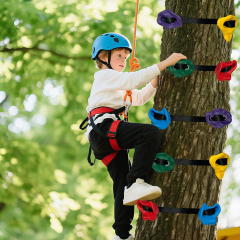 Child climbing tree using 12 Piece Large Ninja Tree Climbing Holds Kit For Kids With 6 Ratchet Straps in bright colors.