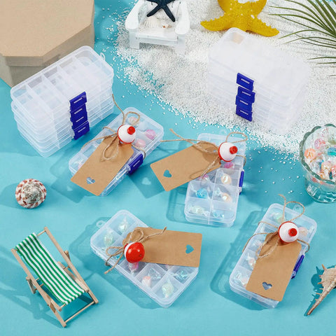 30 Piece Fishing Candy Boxes Set With Red And White Bobbers, Kraft Paper Tags, and 20m Jute Twine displayed on a beach theme setup.
