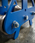 Industrial Heavy Duty Cable Puller Sheave For Smooth Wire Rope Pulling And Cable Feeding with blue steel frame and stainless rollers.