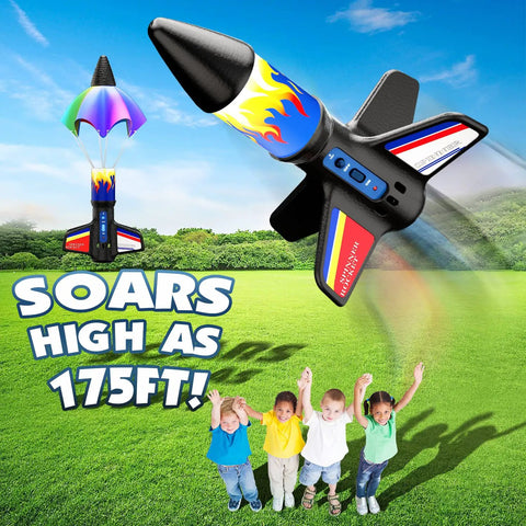 Electric Flying Model Rocket Kit For Kids With Launcher And Parachute Recovery System, USB Charging Cable Included, Fully Charged In About 35 Minutes, Reusable Backyard Fun For High Fliers. Foam rocket with parachute open on grassy field