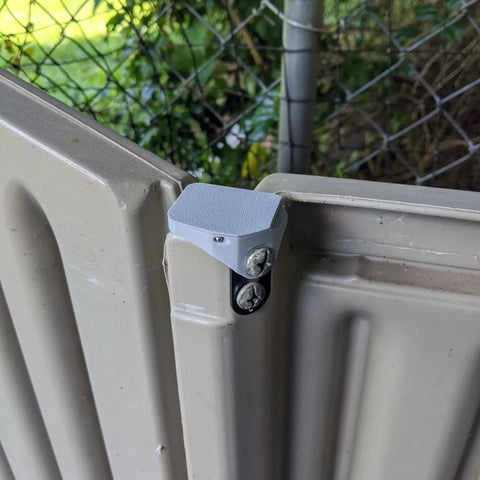 Hella Tough Steel Core Left Replacement Hinge For 6X5 Resin Shed Door Slide Lid Heavy Duty Upgraded Metal Reinforced 3T16 Compatible hardware mounted on a resin door.