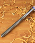 Kickass Three Piece HSS Bowl Gouge Set Featuring Solid Beech Handles For Flawless Bowl And Vessel Turnings Heavy Duty Woodturning Lathe Tools For The Modern Craftsman on a wood surface with shavings.