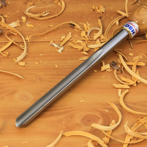 Kickass Three Piece HSS Bowl Gouge Set Featuring Solid Beech Handles For Flawless Bowl And Vessel Turnings Heavy Duty Woodturning Lathe Tools For The Modern Craftsman on a wood surface with shavings.