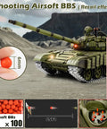 One Sixteenth RC Tank T 72 Soviet Battle Ready Toy firing BBs with green body, metal tracks, and detailed turret on rocky terrain.