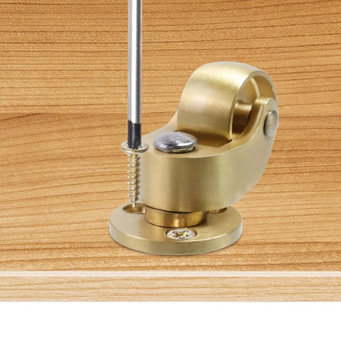 Close-up of Badass Solid Brass Swivel Caster with threaded rod base, ideal for floor mats, showcasing polished finish.