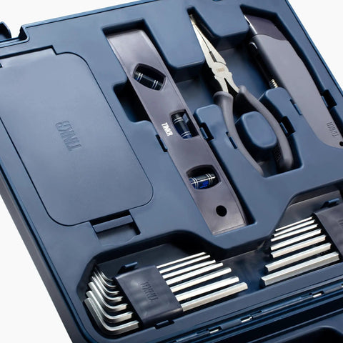 Close-up of All In One Home Tool Kit with level, pliers, Allen keys, in blue case for quick DIY fixes and everyday projects.