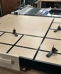 Woodworking table setup with 12 Inch T Track Kit 40 Pack For Woodworking With Double Cut Universal T Tracks and hold down clamps.