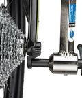 Derailleur Hanger Alignment Gauge DAG Two Point Two Pro Grade Bike Tool installed on bicycle with thru-axle setup.