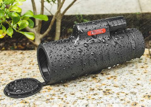 Compact 8x42 Monocular Telescope For Outdoorsy Adventurers Waterproof Fogproof Shockproof With Hand Strap HD View on wet surface