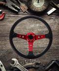 Deep Dish 14 Inch PU Racing Steering Wheel For Cars Golf Carts Trucks And Simulators With Red Horn Button on wooden surface