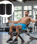 Man using weight bench with 2 Pack Leg Extension Pad Replacement With 7 Inch Foot Foam Rollers installed, exercising in home gym.