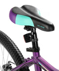 Purple saddle and part of frame on 26 Inch Mountain Bike For Women With 18 Speed Gears Front Suspension Aluminum Frame Adult Ladies Bicycle
