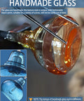 Artisan crafting process of Two Pack Kitchen Island Pendant Lights With Hand Blown Brownish Blue Seeded Glass Shades Brushed Nickel Finish Modern Farmhouse Vibe Over Sink Dimmable LED Compatible One Light Per Pendant.