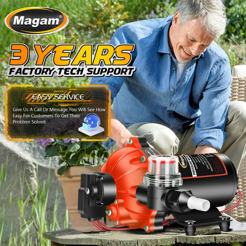 Man demonstrating Beefy 12V Wash Down Pump Kit With 7.5 GPM And 80 PSI For Boats RVs And Campers in a garden setting