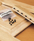 Wood Door And Panel Expansion Spacers 0.26 Inch Diameter with rubber balls preventing panel cracking shown on wooden panels