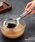 Person using 304 Stainless Steel Fine Mesh Strainer With Handle Skimmer For Kitchen Must Have Pro Grade Dishwasher Safe Colander