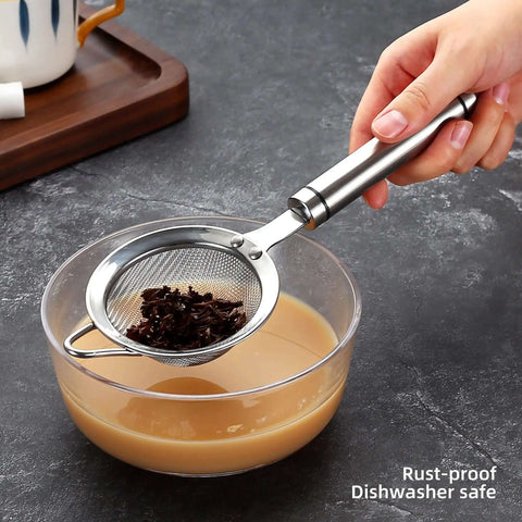 Person using 304 Stainless Steel Fine Mesh Strainer With Handle Skimmer For Kitchen Must Have Pro Grade Dishwasher Safe Colander