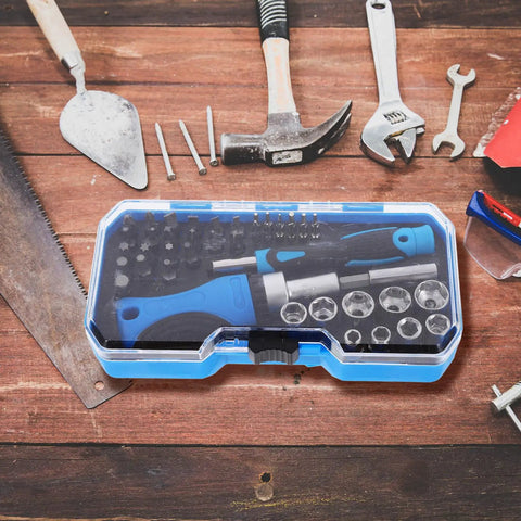 Gutsy Heavy Duty Ratchet Socket Wrench Kit With Extra Screwdriver Bits And A Snap Shut Carry Case on wooden surface