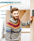 Man using Indoor Outdoor Thermometer With Wireless Sensor, Humidity Monitor, And 24 Hour Display For Home, Office, Or Patio.