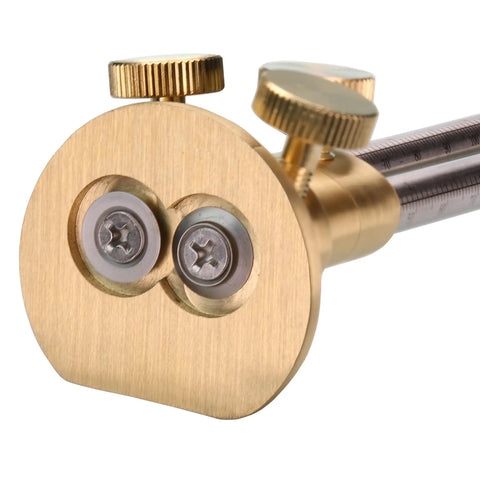 Close-up of Dead On Double Blade Marking Gauge Kit with Sweet Brass Fence, showcasing dual HSS blades and metric scale.
