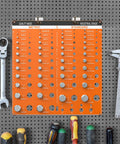 Dual SAE And Metric Nut And Bolt Thread Gauge Set For Quick No Fuss Precision Identification Of 22 Standard Threads And 24 Metric Threads With Eight Drill Bit Gauges on a perforated wall, with tools surrounding it.