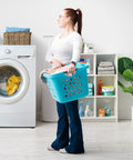 Woman holding Deep 30L Laundry Basket Hamper Organizer With Built In Comfort Carry Handles So Handy Ventilated Nestable Design 2 Pack Medium Teal
