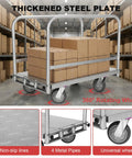 Heavy Duty Steel Platform Truck With Triple Side Handrails And Two Thousand Five Hundred Pound Load Capacity To Honestly Haul Mattresses Bed Frames Or Shop Gear Anywhere loaded with boxes in a warehouse.