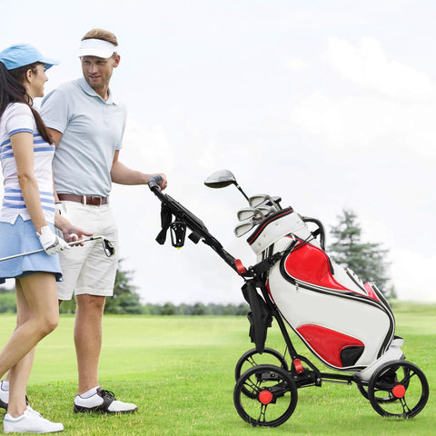 Ultralight Aluminum Golf Push Cart With Quick Snap One Click Fold Design And Large Ten Inch All Terrain Wheels That Glide Hella Smooth On Any Clubhouse Course on the golf course.
