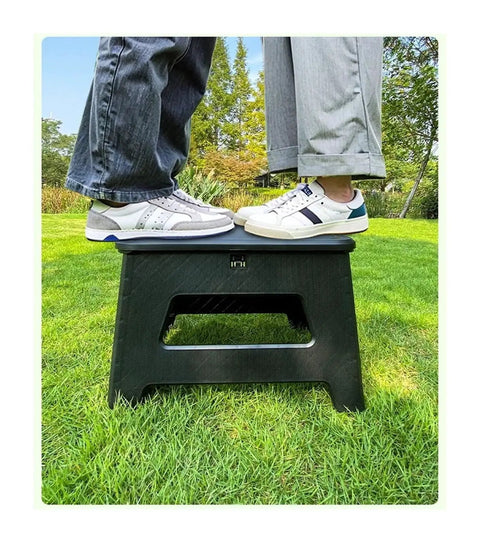 Two people standing on a Portable Camping Toilet For Outdoors Lightweight Rubber Mobile Toilet Gear For Hiking And Camping.