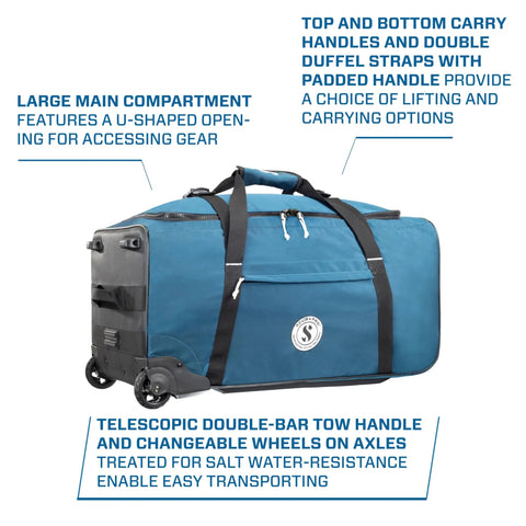 Sport 105 Wheeled Dive Bag With Telescopic Tow Handle Dual Carry Handles And Duffel Straps For Scuba Gear Denim Blue Fabric Large Main Compartment With U Shaped Access External Compression Straps For Easy Load Travel Ready, showing side view with wheels and handles.